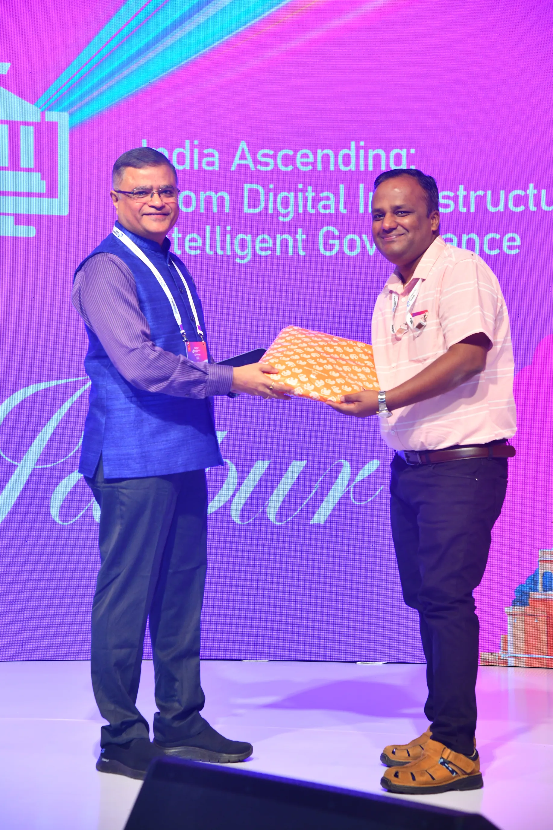 Receiving a memento for active participation at Technology Sabha 2026